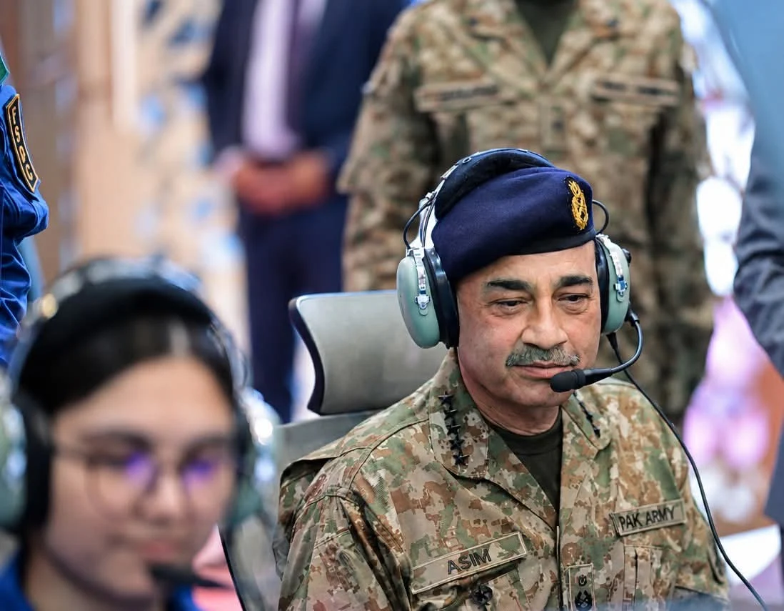 Field Marshal Syed Asim Munir wearing a headset at the FSDC simulator station during Indus RAS Expo 2026