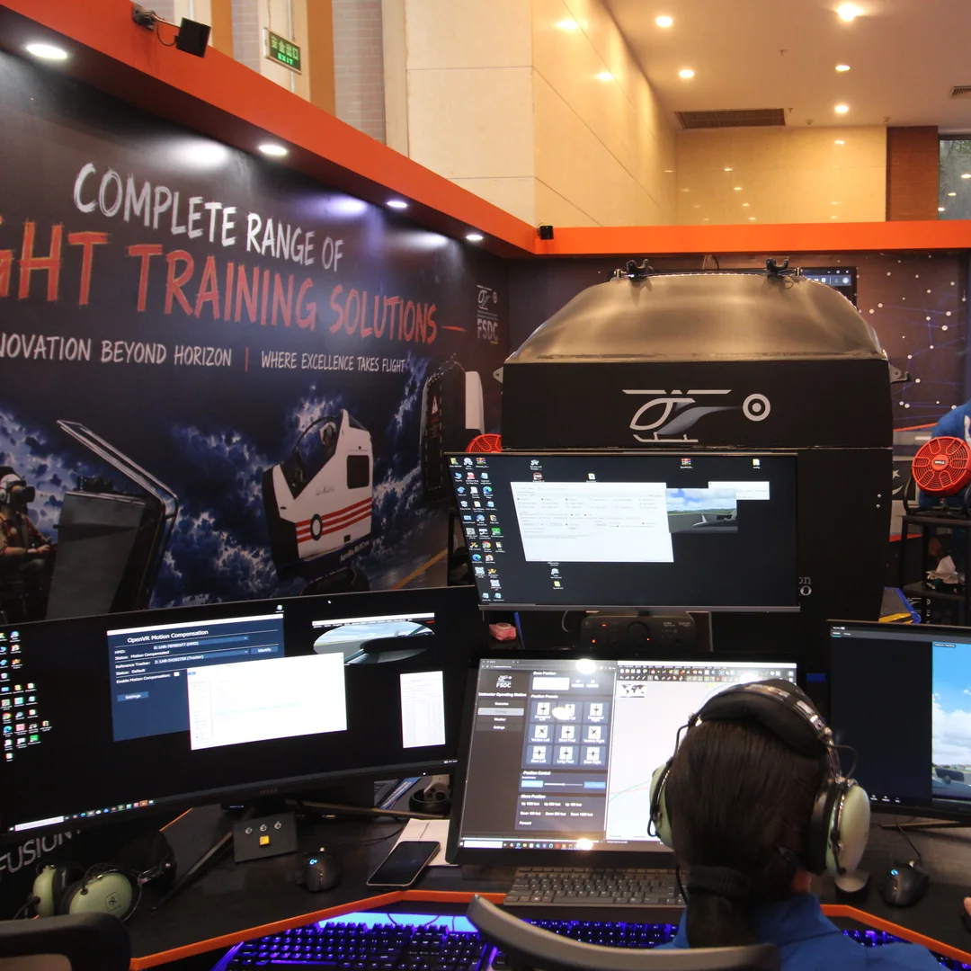 An FSDC engineer running a training scenario from the Instructor Operating Station at Indus RAS Expo 2026
