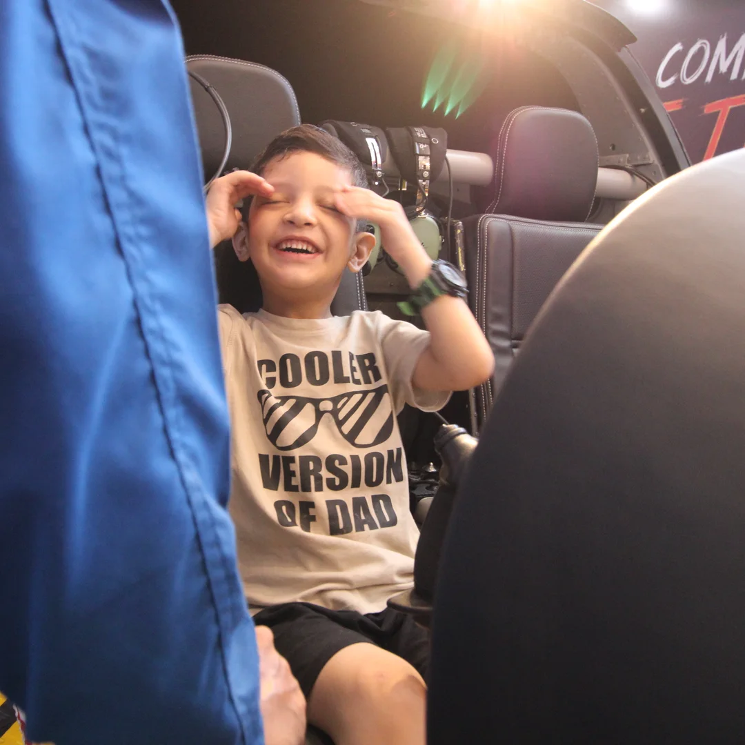 A young visitor in the simulator seat at the FSDC stand, Indus RAS Expo 2026