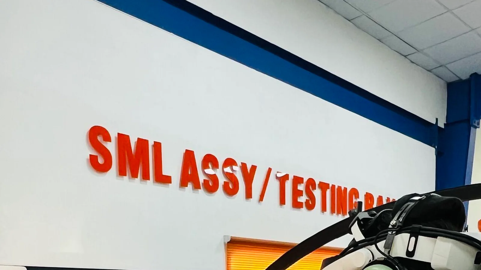 A pilot flying the AeroMix Super Mushshak simulator in the FSDC assembly and testing bay