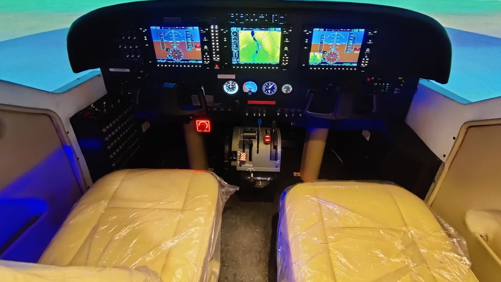 The dual-seat Cessna 208 simulator cockpit during build