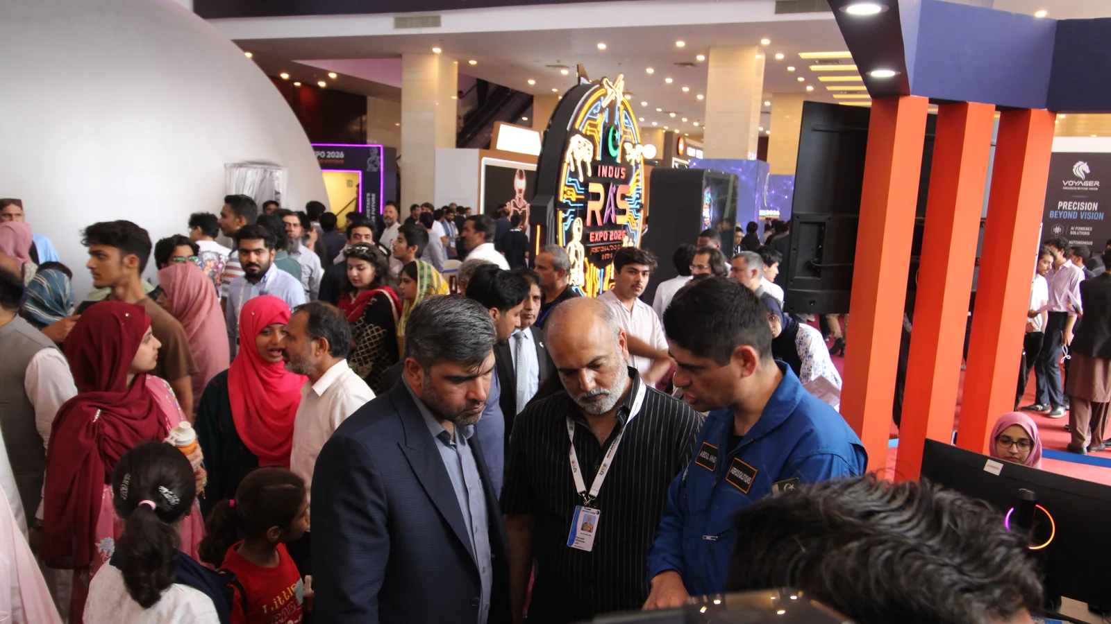 FSDC Aerosolutions engineers with visitors at an exhibition stand